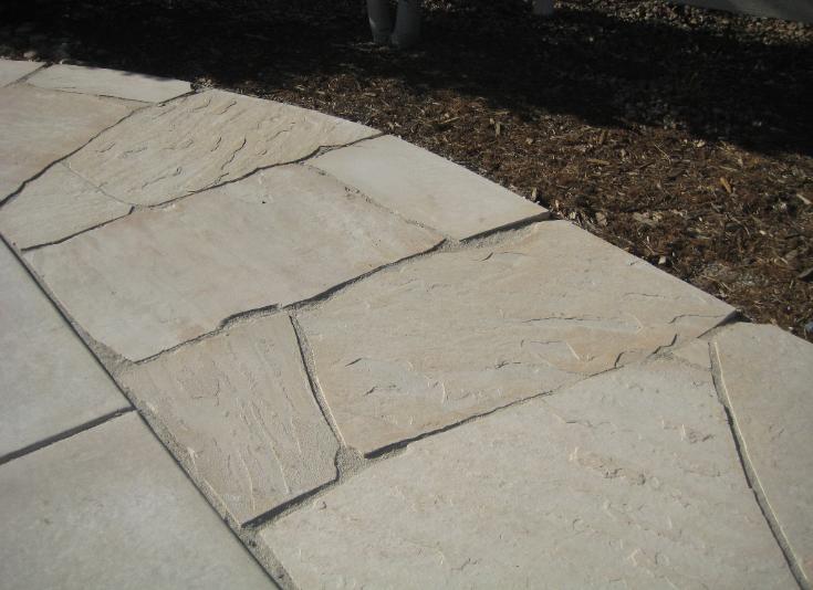 flagstone extention to concrete patio